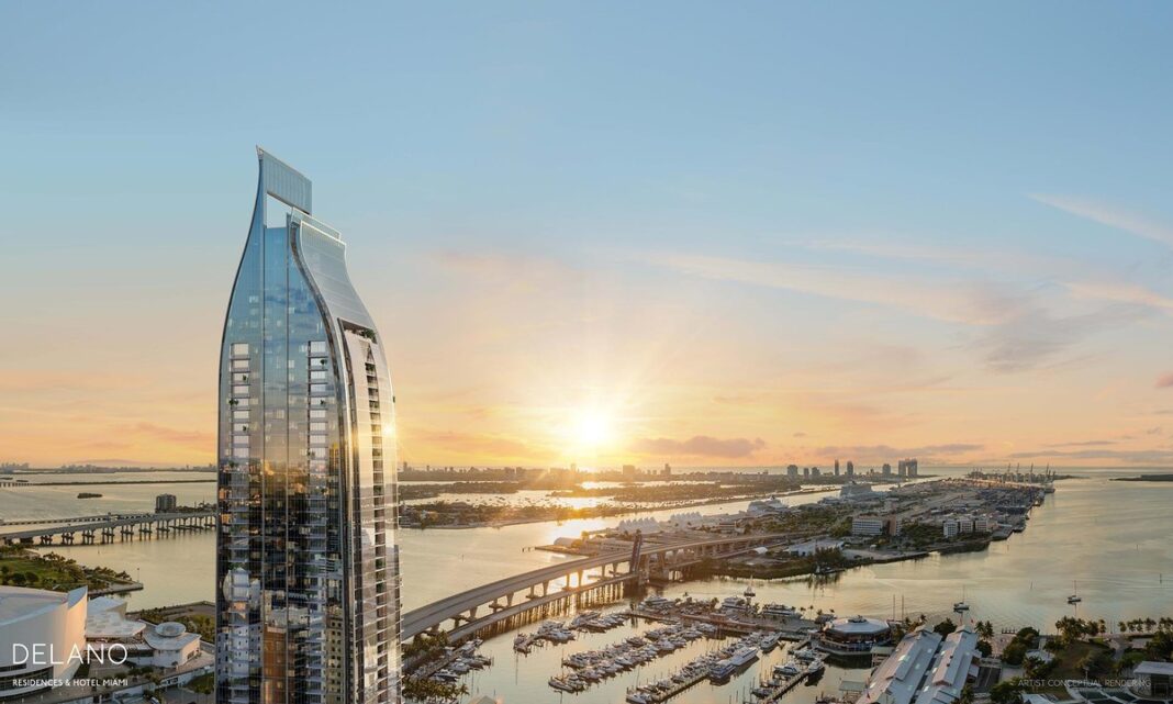 Delano Residences and Hotel Miami 90-story supertall tower at sunset over Biscayne Bay