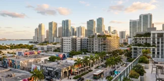 Miami’s New Knowledge Campus: What Carnegie Mellon in Wynwood Means for Buyers Editorial view of Miami's urban core with contemporary residential towers and a former warehouse district turning into a business neighborhood