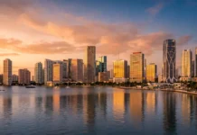 Miami’s Two Migration Stories: What the 2026 Market Report Card Means If You’re Buying Now Editorial view of the Miami skyline with residential towers and the urban core, illustrating the city's two-speed housing market